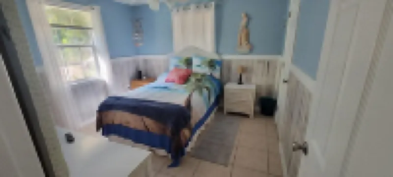 Cozy Beach Cottage 2 blocks to beach near entertainment food & Fun, screen porch
