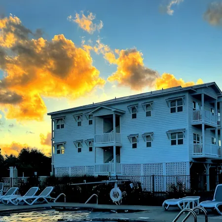 No Cleaning Fee! Brand New Double Queen Studio Condo w/ Waterfront Pool + Beach