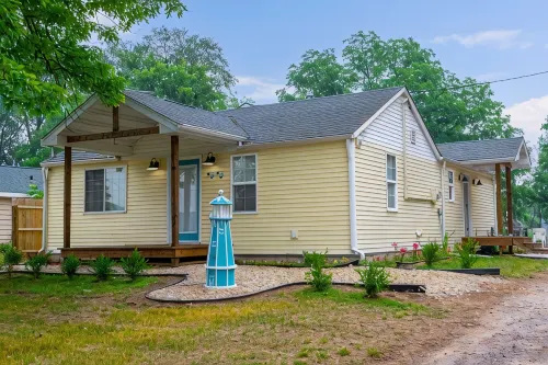 Lake front home with access to two lakes, large yard and RV hookup available!