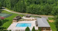 Charming Cabin with Game Room & Firepit