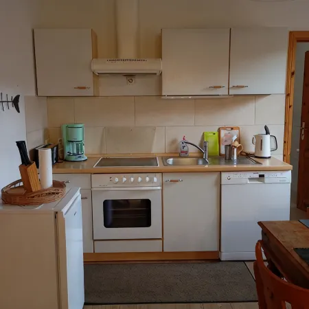 Vacation apartment near the national park and harbor with terrace and parking space