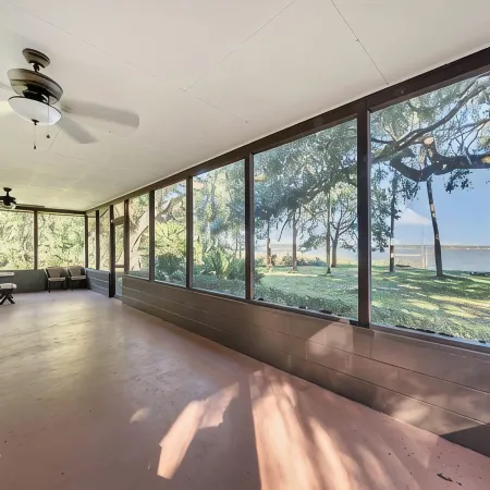 Lakefront home on Lake Kerr near Salt Springs with large porch and great yard