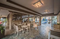 Porto Planos Beach Hotel - Parkplatz