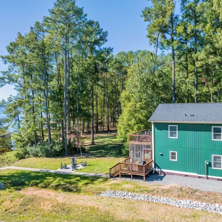 Beautiful lake front cottage, deep water lot with covered dock and amenities.