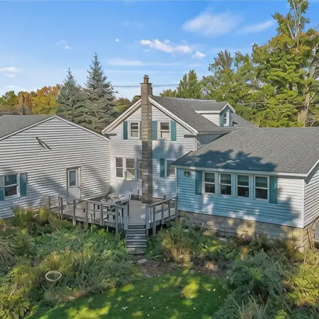 Lakefront Retreat w/ Kayaks, Firepit & Home Office.  Beautiful Sunsets!