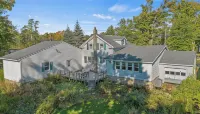 Lakefront Retreat w/ Kayaks, Firepit & Home Office.  Beautiful Sunsets!