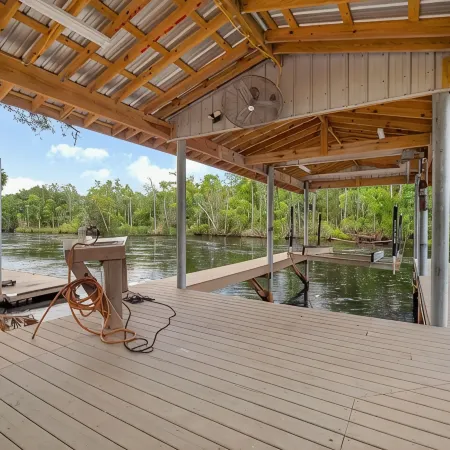 3-bedroom Riverfront home with private boat dock and view of Steinhatchee River.
