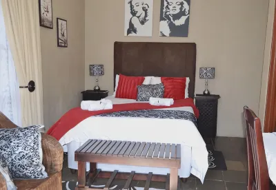 Ikhanda Guesthouse โรงแรมใน