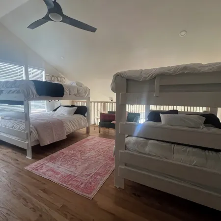 The Birdcage at The Hawk sleeps 10 - 2 bedrooms & 2 1/2 bathrooms.