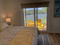 Charming New Blue Studio on water with dock, WiFi & AC in fun time Freeport Hotels in Freeport