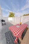 Steps to Beach & Shops - King Suite - Private Patio & Grill + Parking