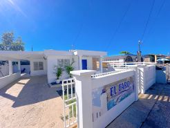 Charming 3-bedroom Beach House with AC and WiFi near Arecibo's best beaches.