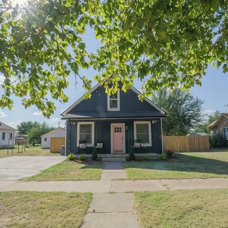 Blue house on 5th! Arcade room, fire pit, privacy fenced yard, and more!!