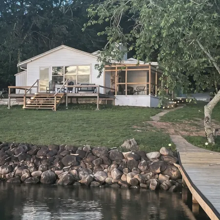 Lakefront home on the main channel w/ beautiful view and a boat ramp next door!