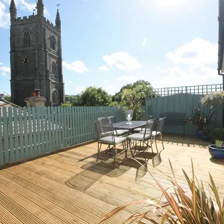 Private decking area & Central location within 5 min walk of town.
