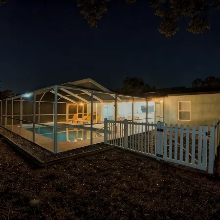 Four Beds, three baths, heated pool, and a Golf Course. What more do you need!!