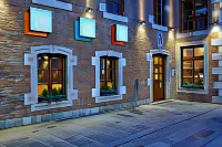 Les Tanneurs Hotels near Passion Garden Theater
