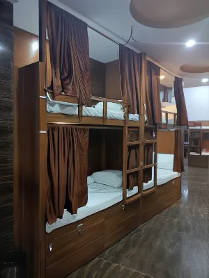 Crystalinn Dormitory Hotels near Sri Sri Radha Giridhari Temple