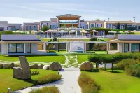 Grande Baia Resort & Spa Hôtels à proximité de : Spiaggia Li Cuppulati e Li Cucutti
