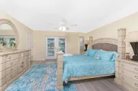 Newly Remodeled 4BR/3BR Canal Front Retreat w/ Pool Near Golf Course & Beach FL - 4-Star
