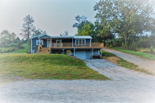 Riverfront- Upper Unit | Dock | Firepit | Hot Tub | Wi-Fi