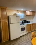 Cozy 2-bedroom cabin near endless trails. Family and pet friendly. Fire pit & AC
