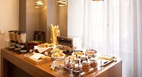 Grand Hôtel du Tonneau d'Or - servizio colazione