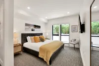 Pets Stay Free • Private Terrace • Elevator • King Beds • In-Unit W/D