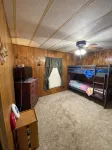 Quiet cabin in the woods w/ access to pools, river, & lakes in gated community!! - Feriehus