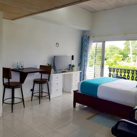 Peaceful intensely clean unit overlooking tropical gardens and golf course