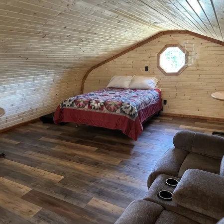 White cabin in the woods close to Univ. of Central Missouri and Whiteman AF Base
