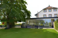 Auberge de Confignon Hôtels à : Confignon