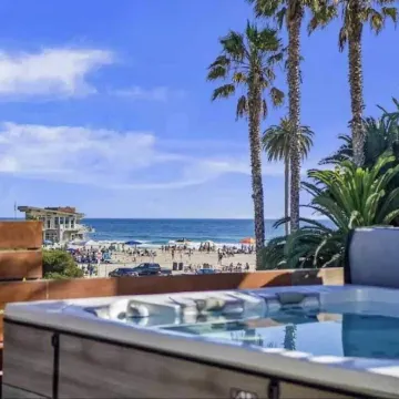 Steps to BeachShops Oceanview Hot TubFirepit Moonlight Modern by AvantStay