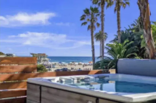 Steps to BeachShops Oceanview Hot TubFirepit Moonlight Modern by AvantStay