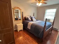 Spacious five-bedroom home off Back Lake with direct trail access on Spooner Rd