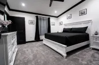 Lakefront Retreat w/Hot Tub, Arcade & Sunset Views - 4-Star