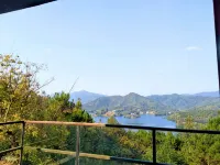 Guanglv. Bama Lake Narada Resort Hotel - balcony