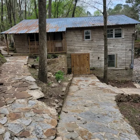 Historic Cabin in a natural setting with waterfalls and covered bridge