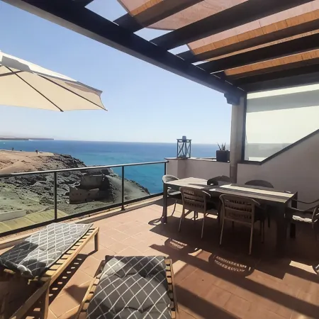 Best location on 2 floors (with penthouse) directly by the sea. Dream view from 3 terraces