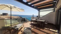 Best location on 2 floors (with penthouse) directly by the sea. Dream view from 3 terraces - Strand