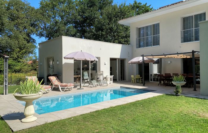 Modern house with swimming pool near the coast