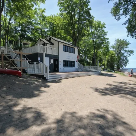 Family Resort Cottage Near Sandbanks | Pools, Lake Access, A/C & Screened Porch