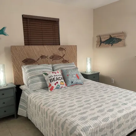 Coco NoKo cozy beach cottage + Swimming pool! Golf cart and pet friendly!