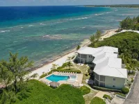 Beachfront Peace!  Awesome top floor condo on Caribbean plus military discount! Hotel a North Side