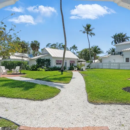 The Historic Coquina Cottages C is 2 Blocks to the Beach, 5th Avenue and 3rd St.