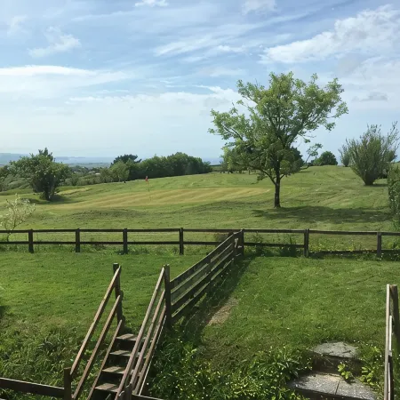 Barn conversion overlooking the golf course to the sea