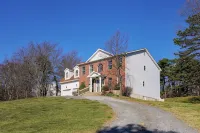 Spacious 6-bedroom Pocono Home with Hot Tub, Game and Theater rooms, Fire Pit! - 5-Star
