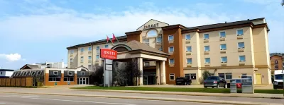 Merit Hotel & Suites