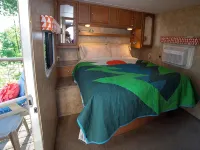 Glamping RV Overlooking Conesus Lake Finger Lakes Region Fire Pit A/C and Pool Hotels in Conesus