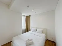 Restful and Good Location 1BR Apartment at Trillium Residence By Travelio - Condos